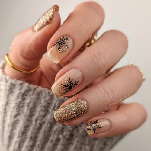 Gold glitter snowflake nails